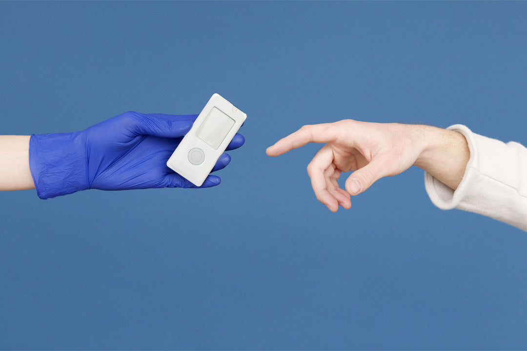 Continuous glucose monitoring sensor adhered to upper arm with adhesive overlay patch